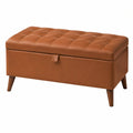 Banc de rangement 110 x 45 x 48 cm en revêtement aspect cuir cognac style capitonné